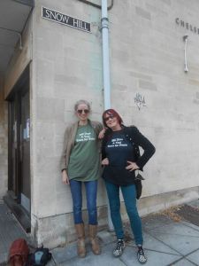 Angie and Kath pose for pictures in the their travel fan tshirts - Location: Snow Hill, Bath UK (England)